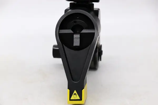 Shrouded Reaction Arm Release
